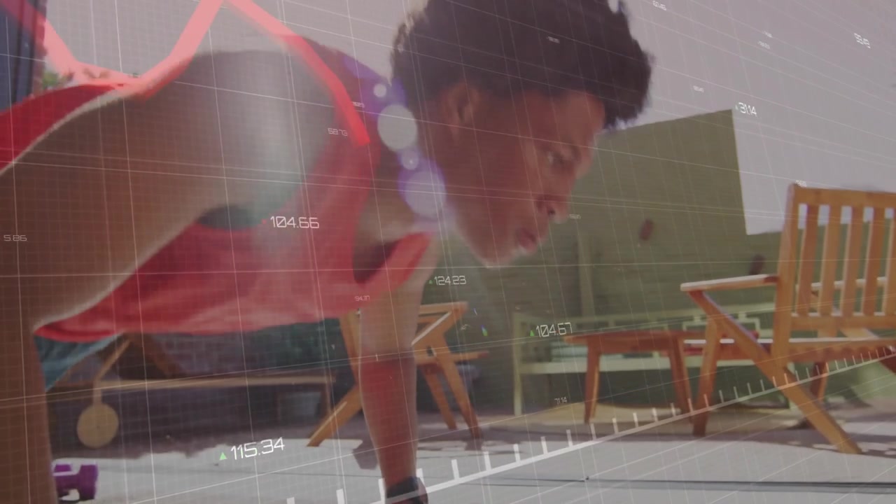 Man placing weight on mat and performing push-ups tracking form with animated fitness chart overlay