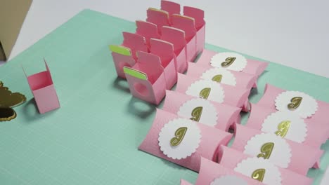 diy pink and gold favor boxes with letter j