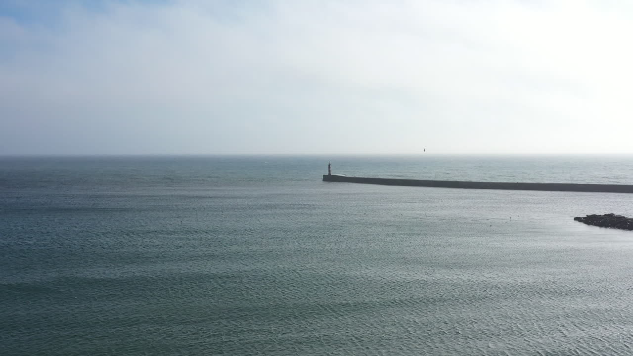 Bird eye view of a pier in the ocean