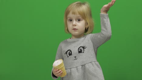 kid girl with ice cream on a green screen, chroma key