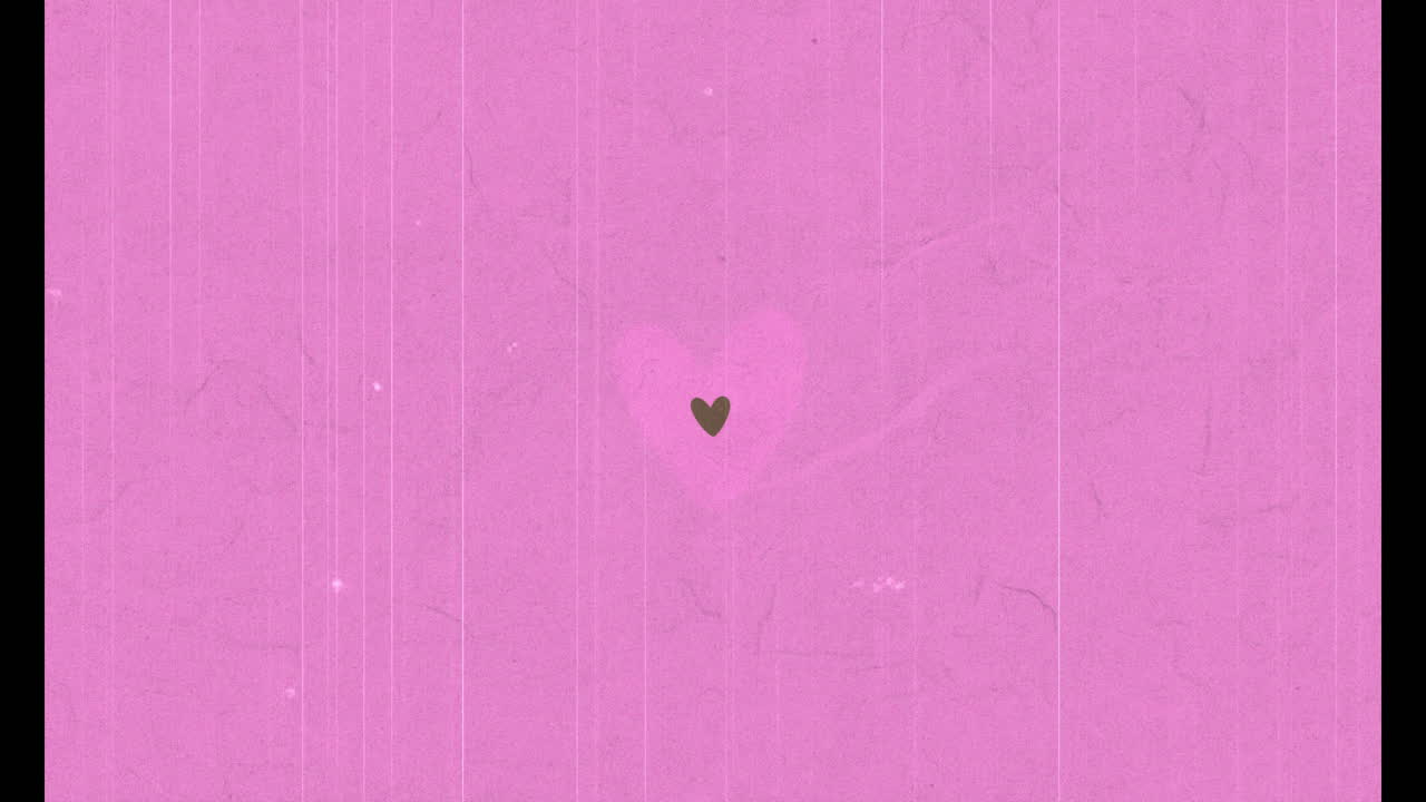 Animazione di cuori colorati su sfondo rosa