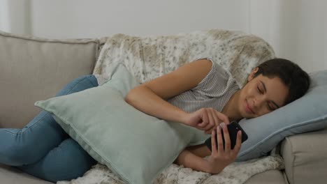 caucasian woman using her phone