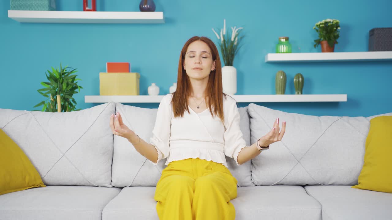 The meditating young woman.
