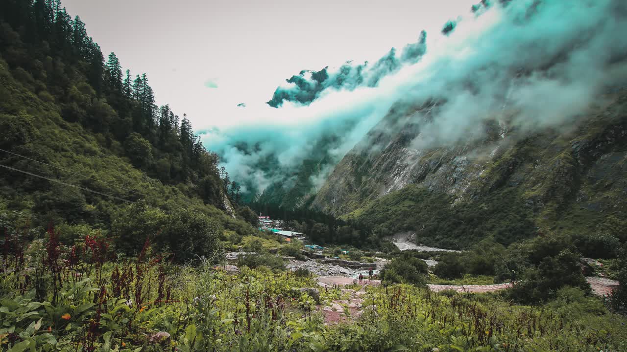 Time lapse footage of clouds moving over a himalayan village
