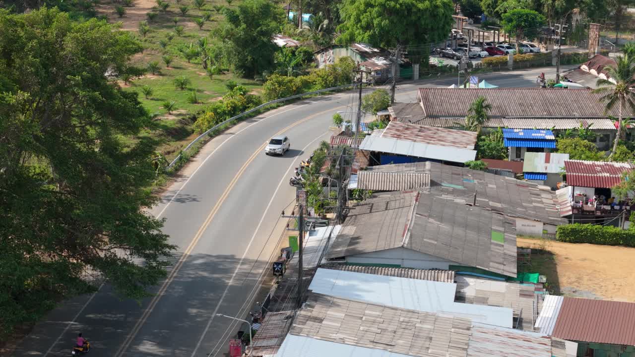 A birds-eye view of Klong Prao main road on a sunny morning with buildings on Koh Chang Island