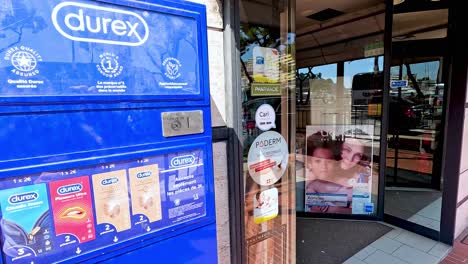 condom vending machine outside a shop in monaco