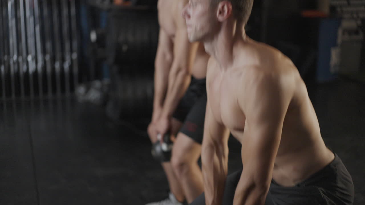 Men working out in a gym