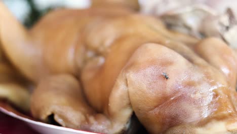 close-up view of rotating cooked chicken