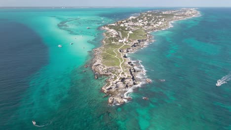 aerial of isla mujeres, mexico zoom out high up, yucatan, mexico