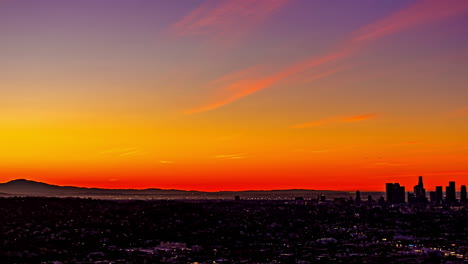 timelapse, night and sunrise above los angeles cityscape skyline, lights and colorful sky