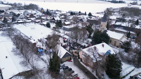 Christmas-market-Winter-Snow-Village,-cloudy-Germany