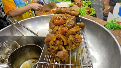 stewed pork knuckle at a street food stall