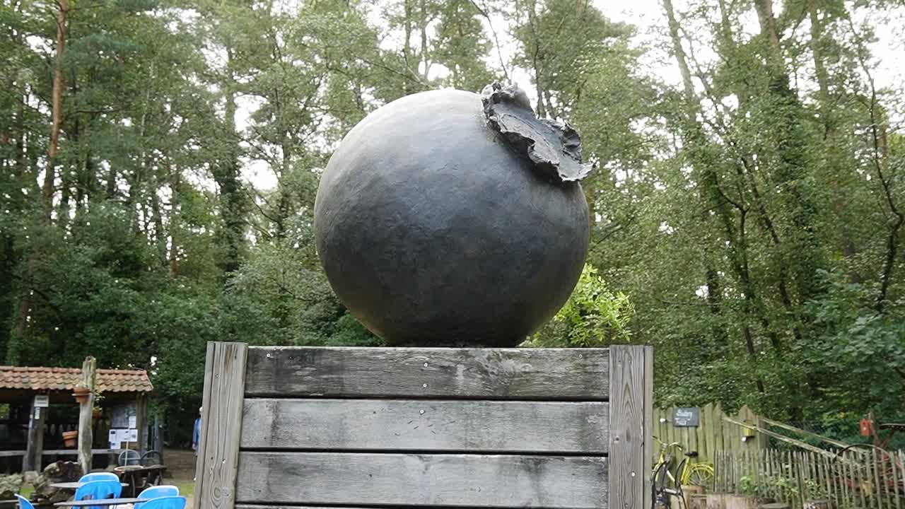 Scenic blueberry statue inside forest of the blueberry fields.