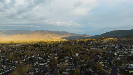 heber utah looking towards midway at sunrise - pullback aerial reveal