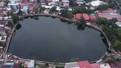 Aerial-view-of-sacred-Gautam-Lake-near-the-Trimbakeshwar-Temple-in-Trimbak-city,-Nashik,-Maharashtra,-India