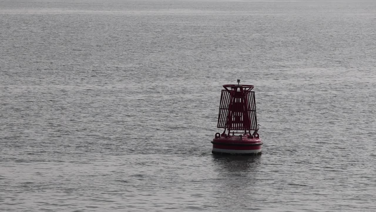 A buoy floating in the sea water