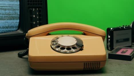retro vintage phone, a yellow rotary telephone is displayed on a wooden desk, adding a nostalgic touch