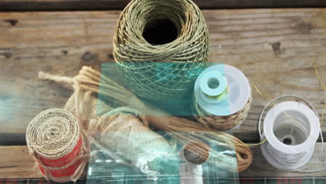 animación de la luz que se mueve sobre hilos y suministros de diy en superficie de madera