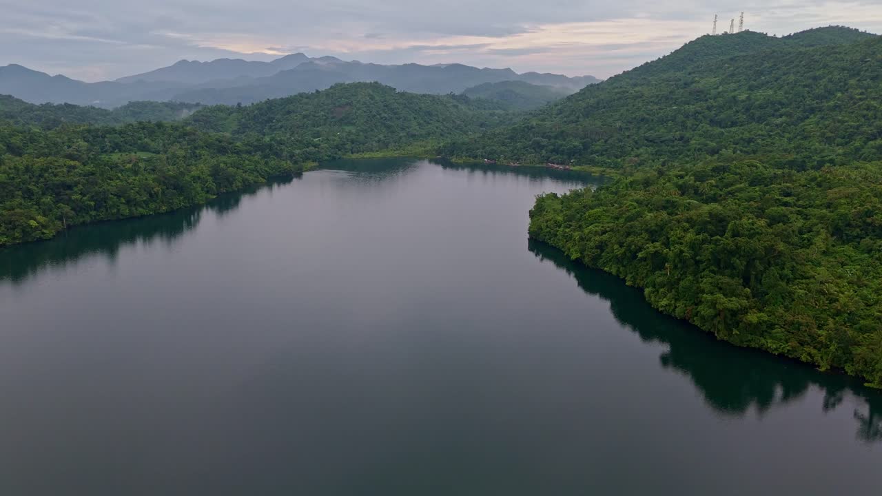 Lake Danao surrounded by lush forests and misty mountains above Ormoc, Leyte, Philippines