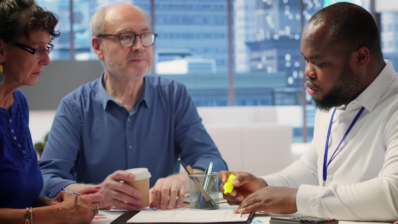 Mature couple receiving professional advice on retirement planning