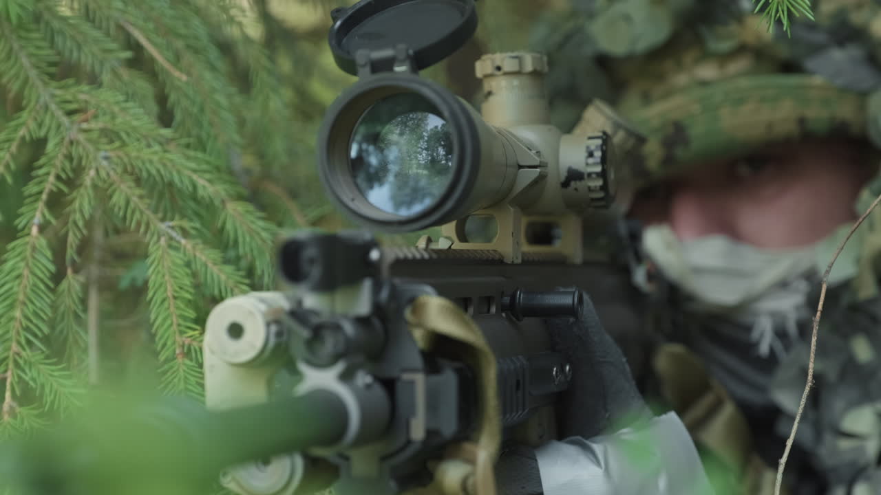 Soldier Sitting With Rifle In Ambush