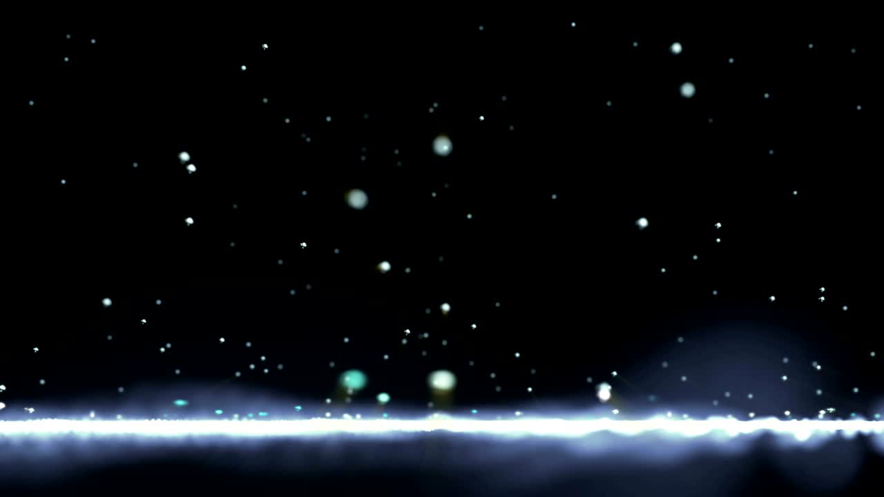White drops fall in rain like bright beads on a moving light surface.