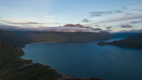 aerial time lapse over chapo lake and llanquihue national reserve during blue hour