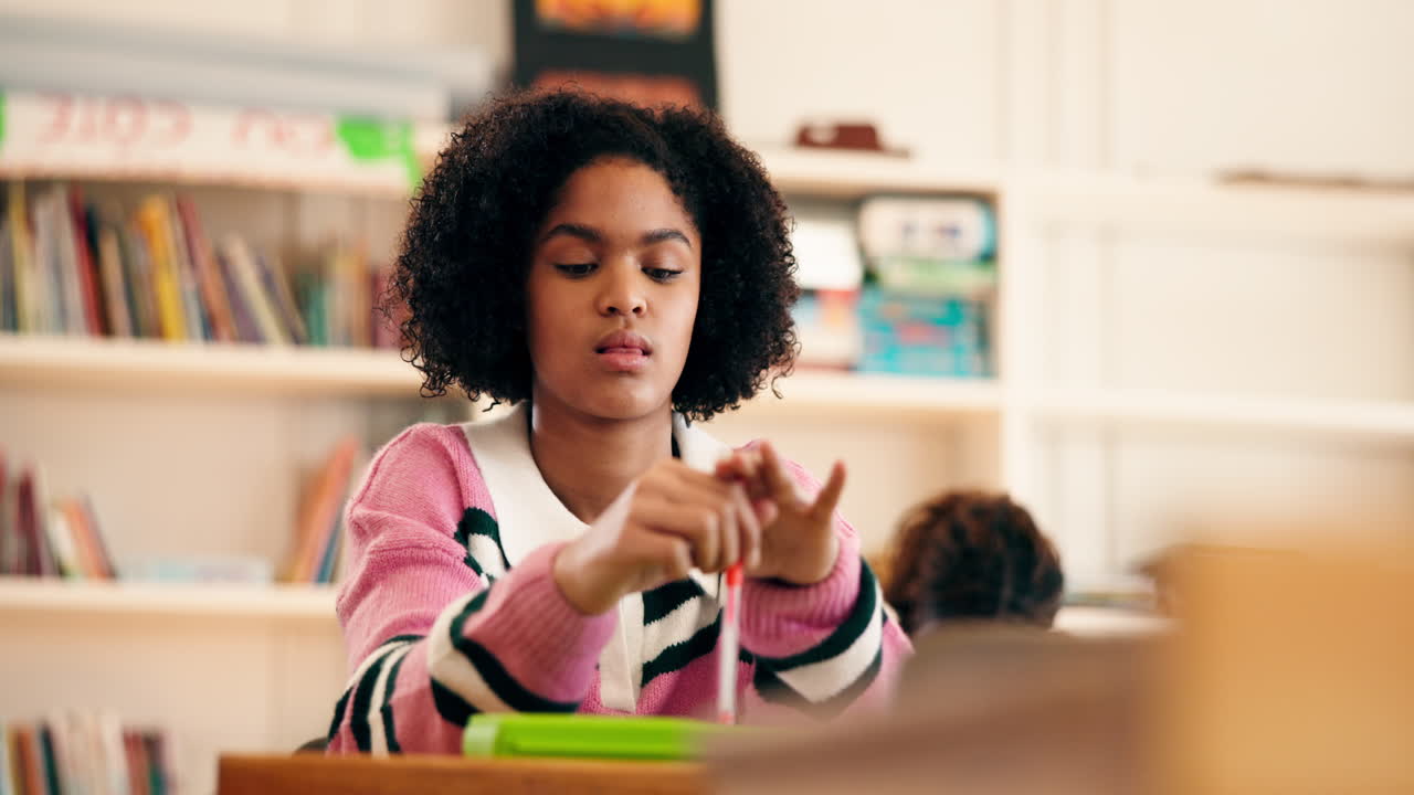 Student Studying in Classroom