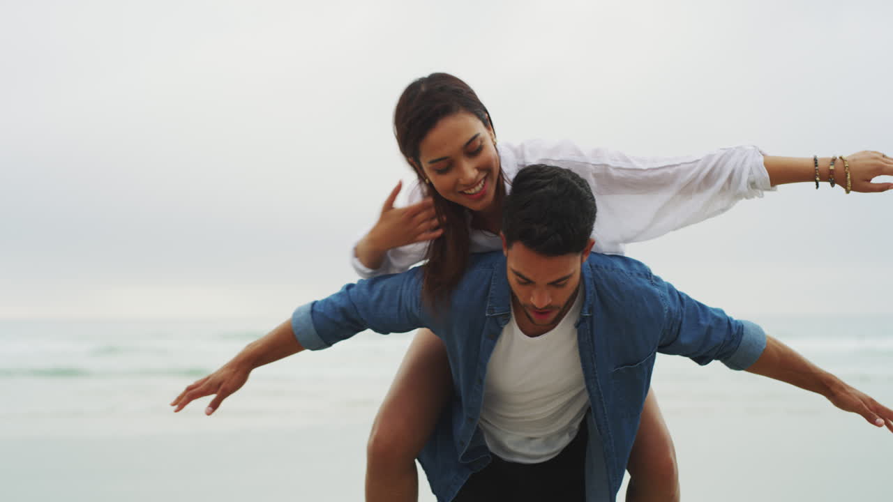 Couple having fun on the beach
