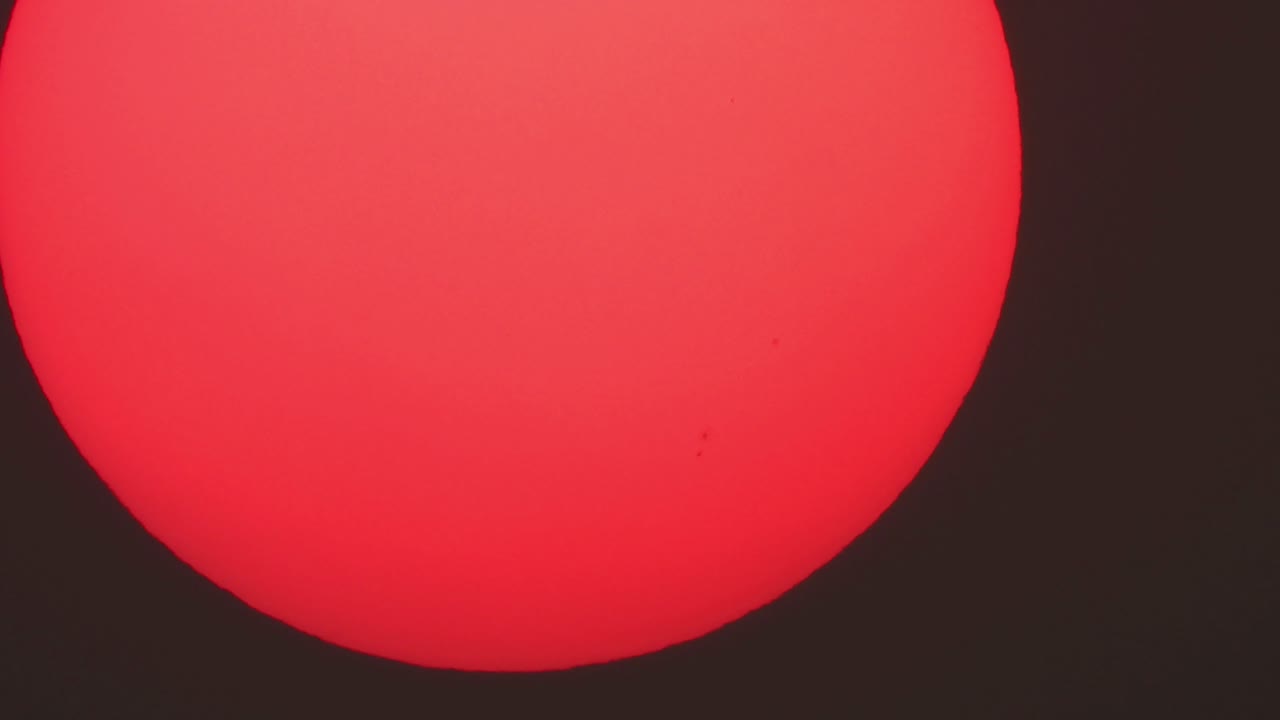 dark spots in sun and beautiful sunset