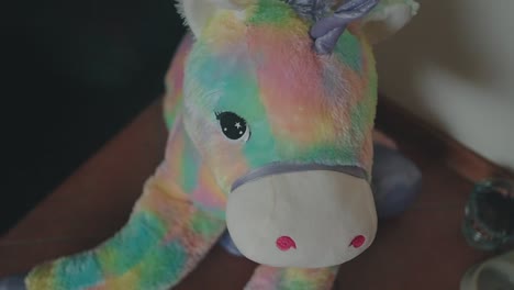 Rainbow-plush-unicorn-toy-close-up