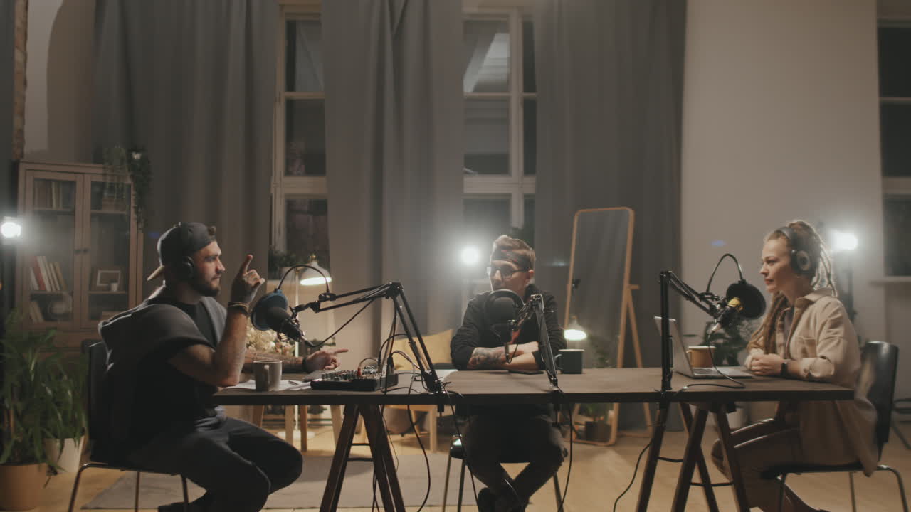 Three Podcast Hosts Having Conversation in Living Room
