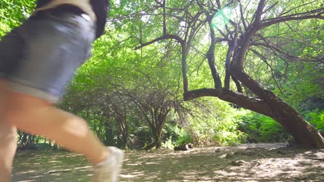 happy young man in the forest.