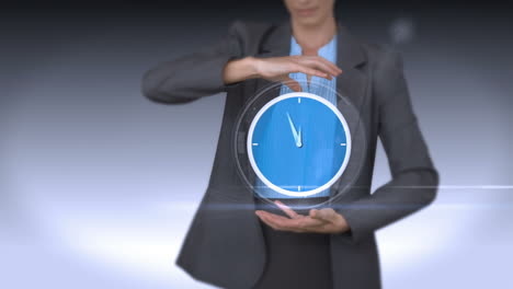 businesswoman holding virtual alarm clock