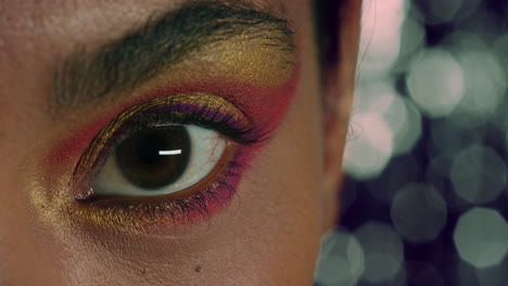 close up macro eye woman wearing colorful makeup eyeshadow gorgeous evening glamour cosmetic beauty concept