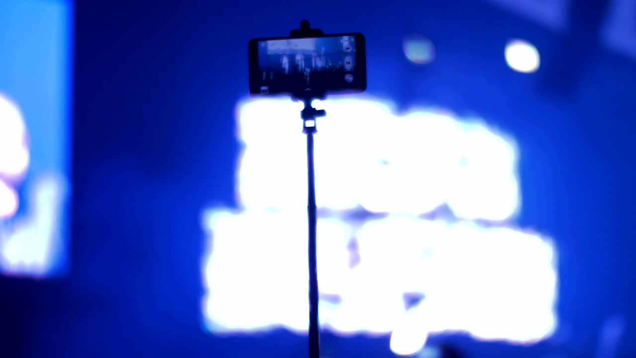 concierto de disparos con teléfono móvil