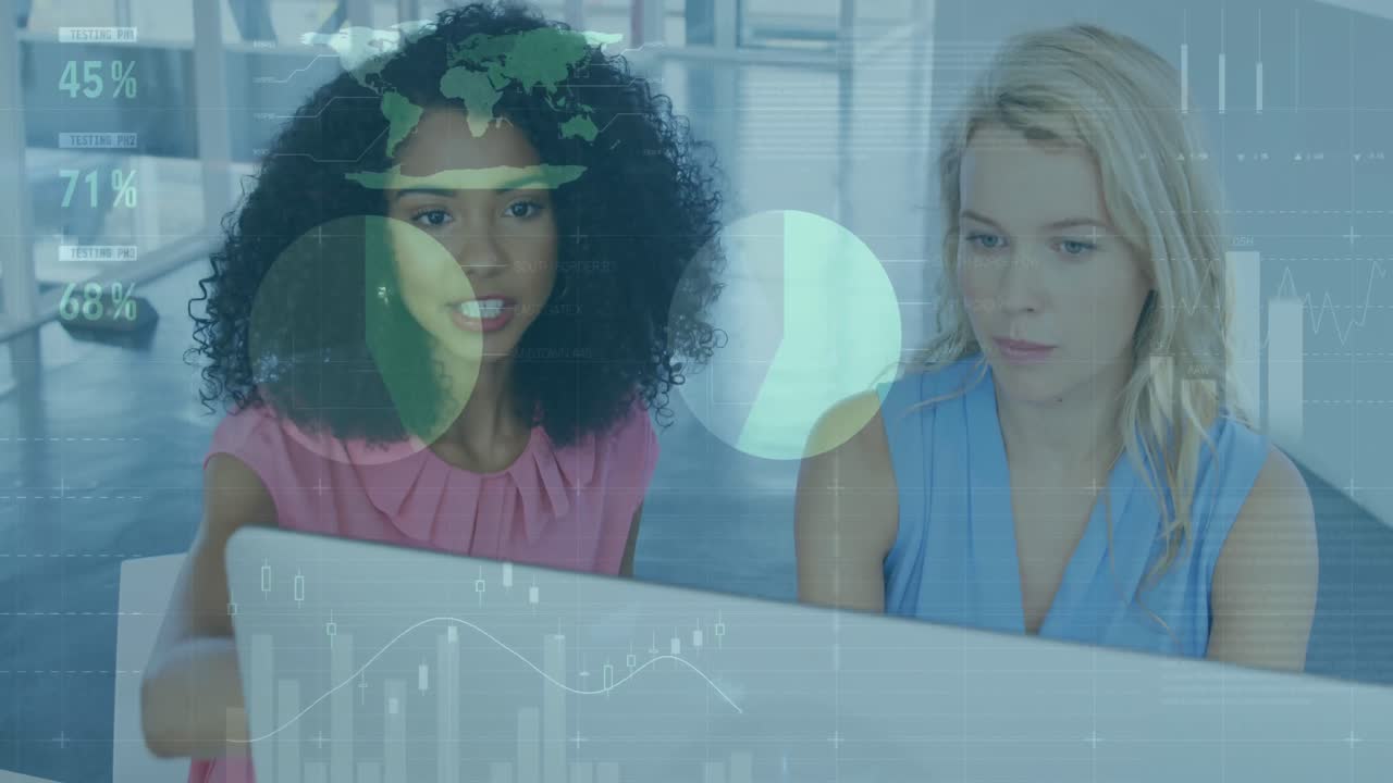 Animation of statistical data processing over two diverse women discussing over a computer at office