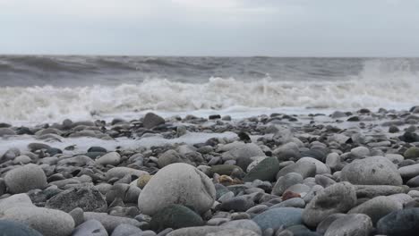 february 2022 storm franklin crashing harsh waves on english pebble stone beach