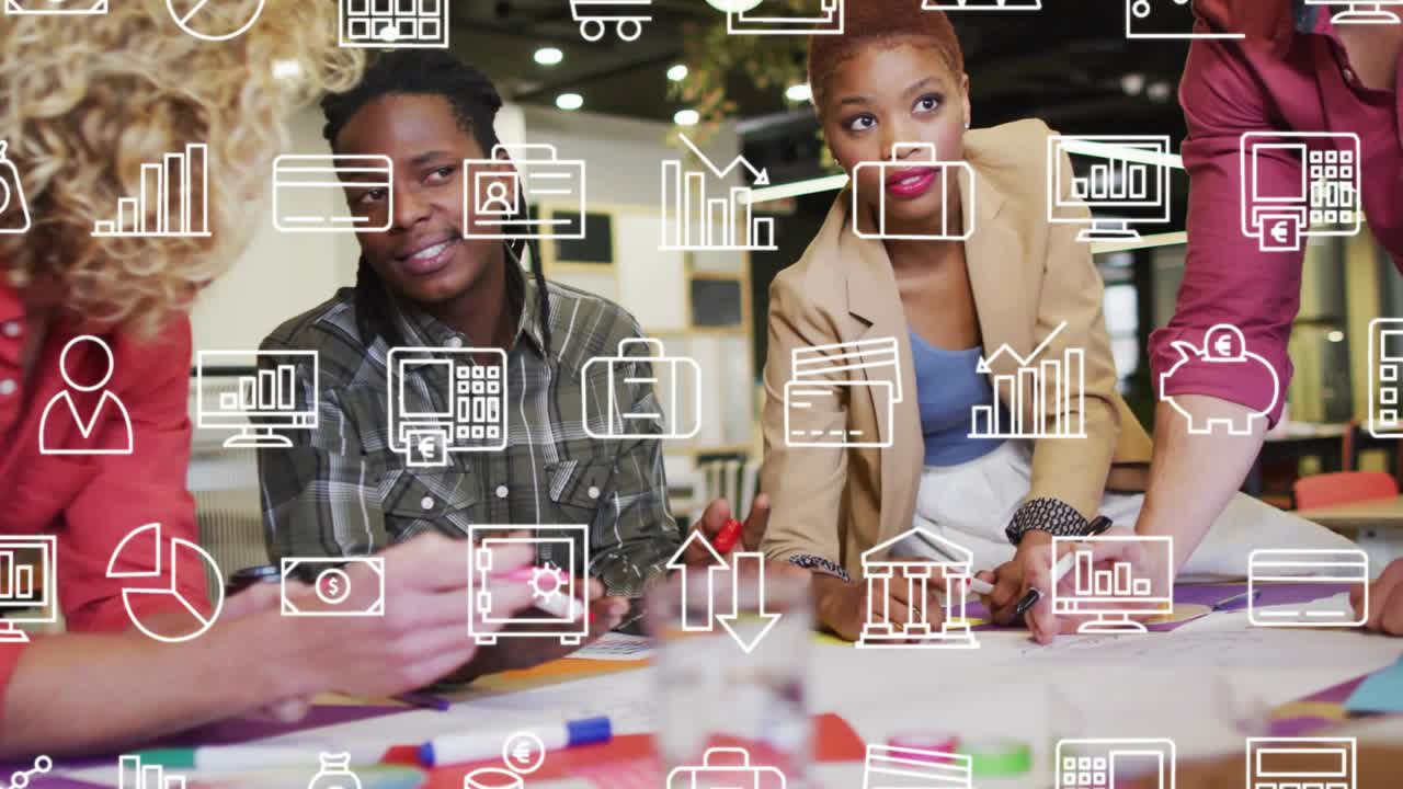 Team gathering around table starting business mapping by clustering sticky notes and sharing ideas