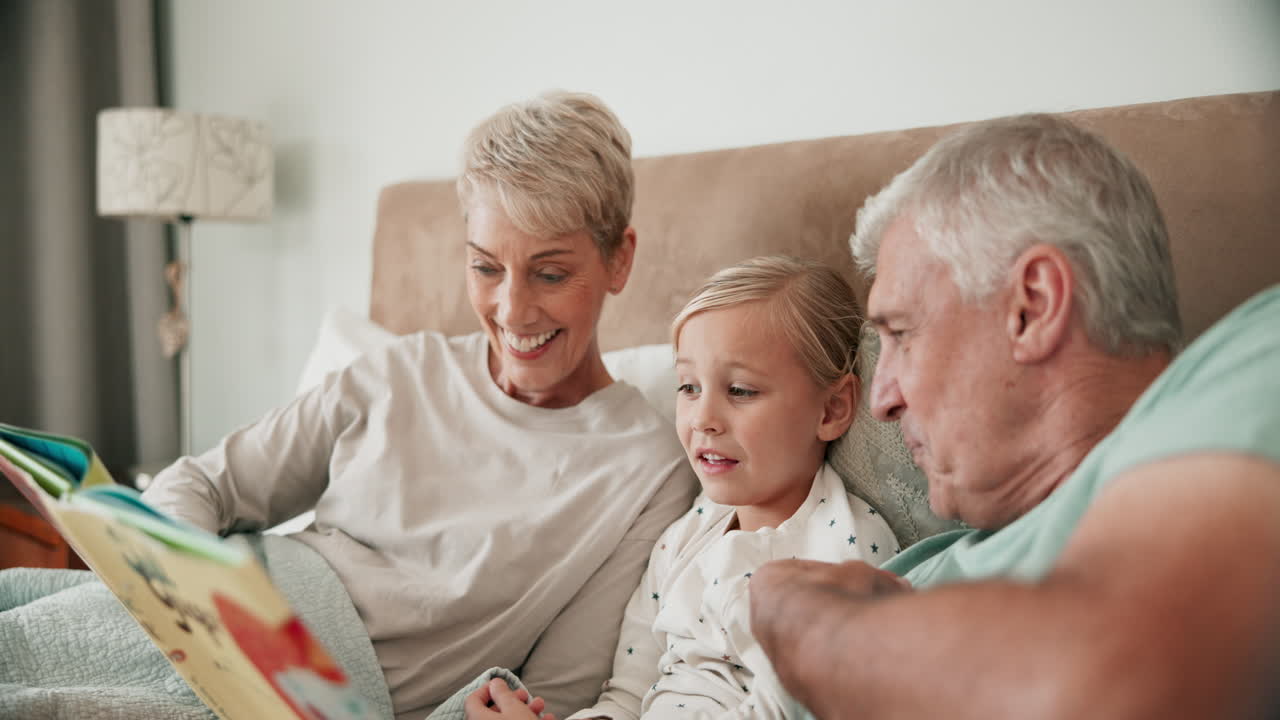 Grandparents, child and reading books in bedroom