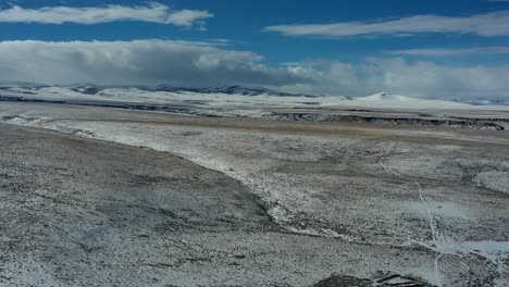 Time-lapse-drone-shot-of-snowy-plain