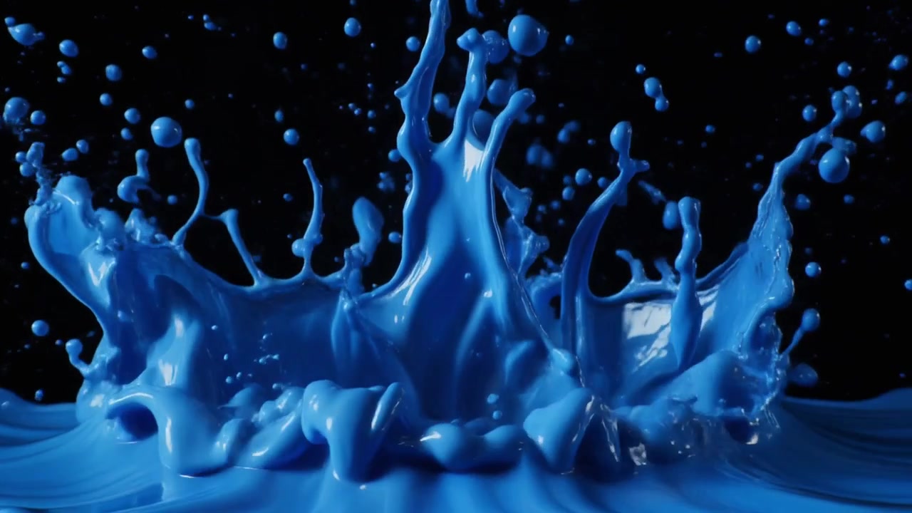 Blue Paint Splashing Against a Black Background