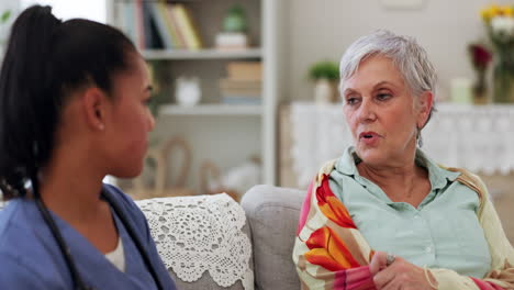 caregiver, talking or consulting an old woman