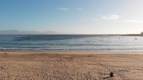 Early-Morning-Drone-Shot-of-a-Beach-in-Mosselbaai-South-Africa