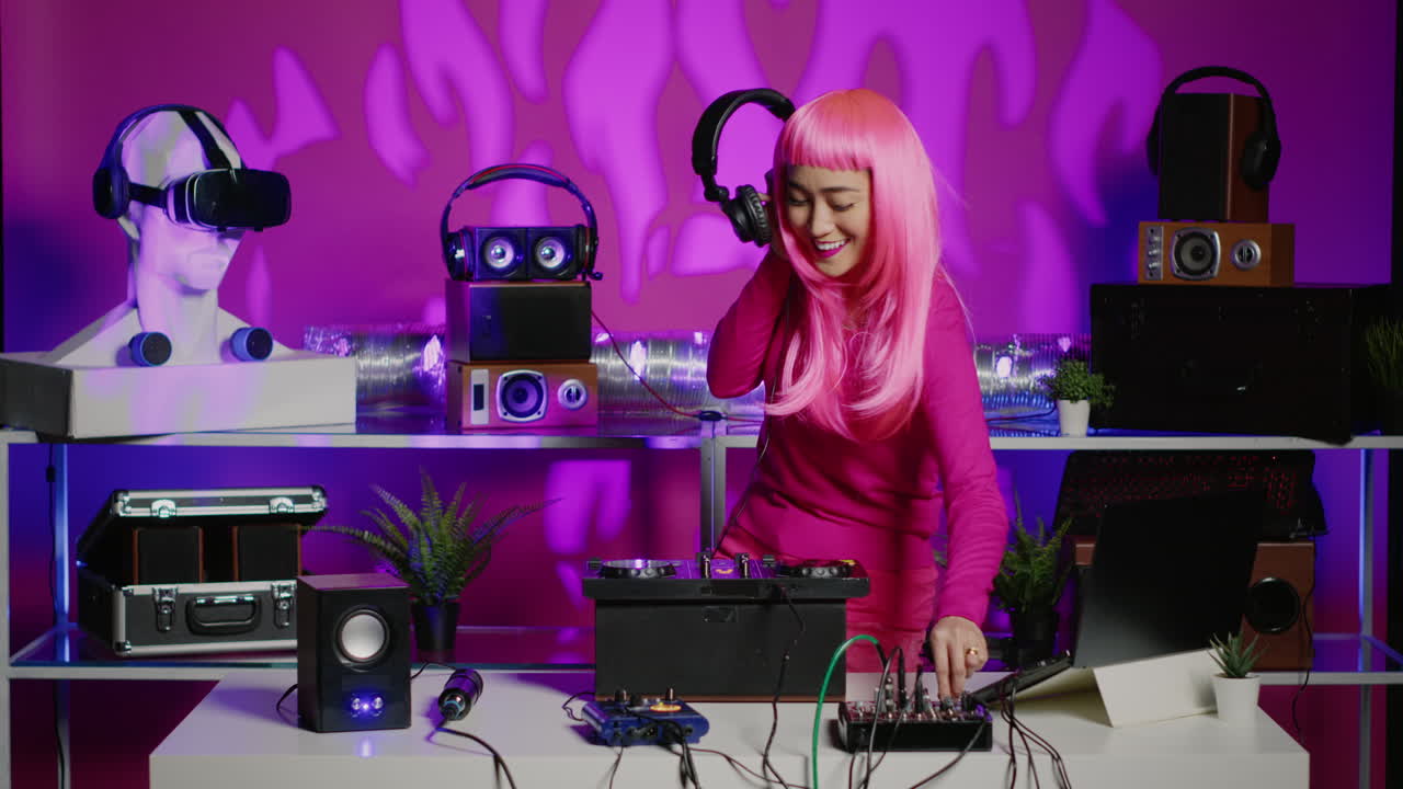 Woman DJ with Pink Wig Mixing Music