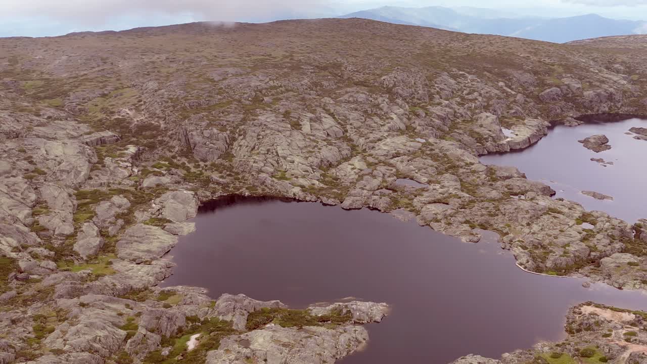 A lake has formed at the summit of the Serra de Estrella mountain peak at Portugal's highest point