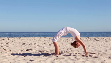 woman doing crab yoga pose
