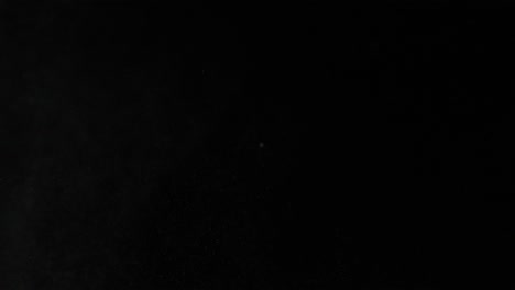 dust particles on black background
