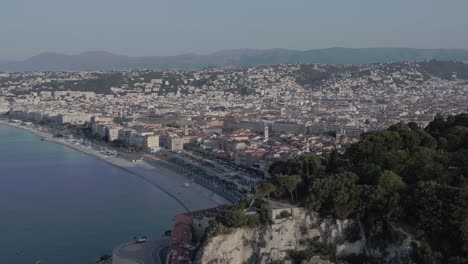 aerial view in french riviera close to foresrt
long travelling drone shot in the french riviera during summer
lot of people on the beach and swimming