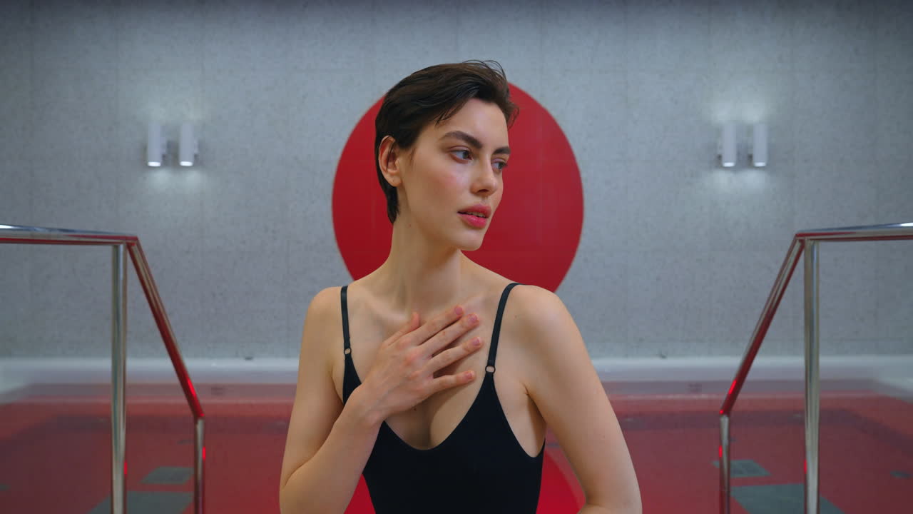 Woman relaxing in a modern spa pool